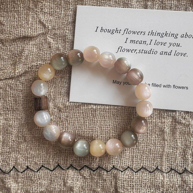 Vintage Rosa-Braunes Perlenarm – Vintage Fashion Exhibition Bewertung und Preis