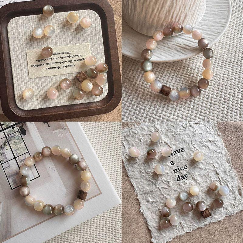 Vintage Rosa-Braunes Perlenarm – Vintage Fashion Exhibition Bewertung und Preis